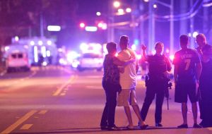 The attack is the worst mass shooting in recent US history. A moment of silence was observed across the US at 18:00 local time (22:00 GMT).