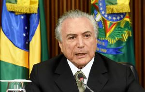 “The world needs to know who is the president” of Brazil, interim president Michel Temer said. 