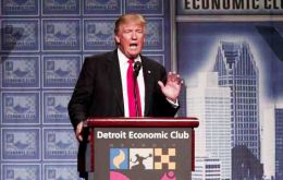 “We are in a competition with the world, and I want America to win,” Trump told the Detroit Economic Club