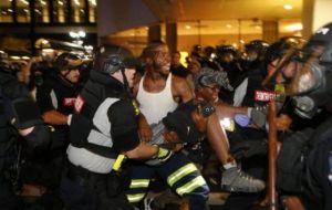 What started out on Wednesday evening as a prayer vigil after Scott's shooting turned into an angry march and then a night of violence.