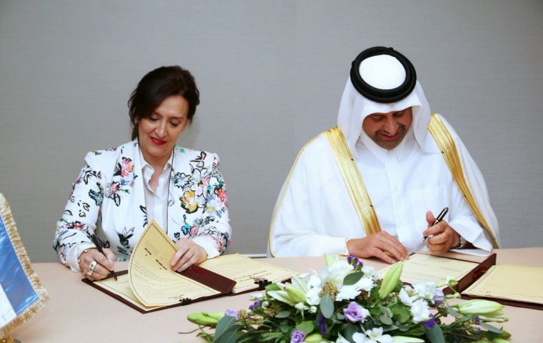 : Argentina's Vicepresident Gabriela Michetti and Qatari Economy Minister Sheik Ahmed bin Jassim Al Thani sign the agreement