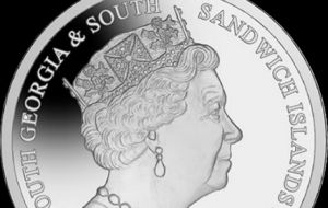 The obverse of the coin features the new effigy of Her Majesty Queen Elizabeth II created for exclusive use by the Pobjoy Mint.