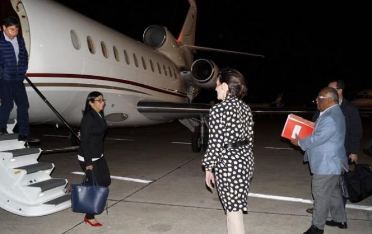 Delcy Rodriguez is greeted at her arrival in Buenos Aires Wednesday early dawn. Bolivia's Choquehuanca is stepping down from the aircraft 