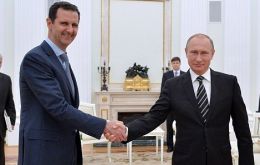 Russian President Vladimir Putin (R), a key ally of Syrian President Bashar al-Assad (L), announced the ceasefire on Thursday after forging the agreement with Turkey