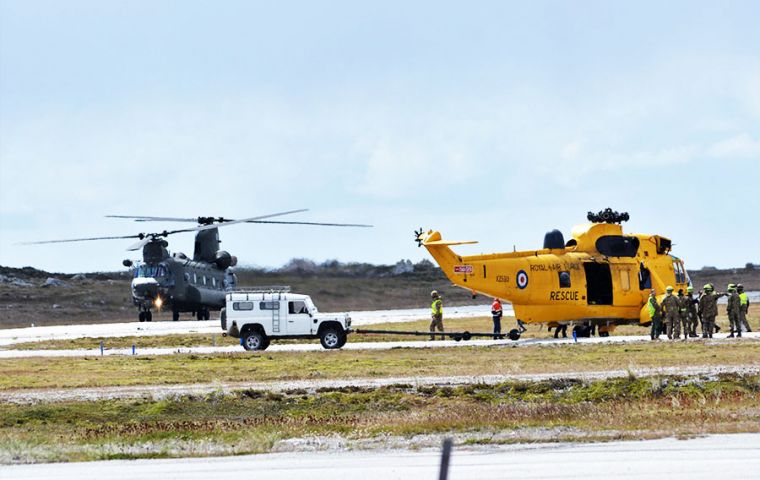 John Clifford pictures are more than illustrative of the spectacular operation to transport the Sea King by a Chinook, until it was finally landed at Stanley Airport