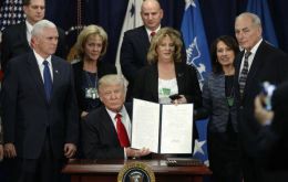 The new US president signed an executive order to beef up the nation’s deportation force and start construction on a new wall between the countries.