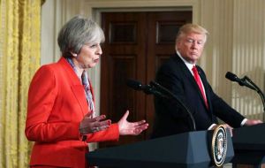May said Britain wants to see sanctions against Russia continued until there is full implementation of the Minsk Agreement, provisions to end fighting in Ukraine.