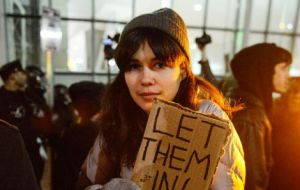 Thousands gathered at airports around the country to protest on Saturday, including lawyers who offered their services for free to those affected. 