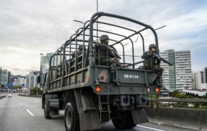 Brazilian President Michel Temer called the police halt “an insurgency against the constitution” but accepted Rio de Janeiro state's request for troops to help police.