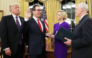  After Mnuchin's swearing-in ceremony in the Oval Office, Trump said Americans should know that “our nation's financial system is truly in great hands.”