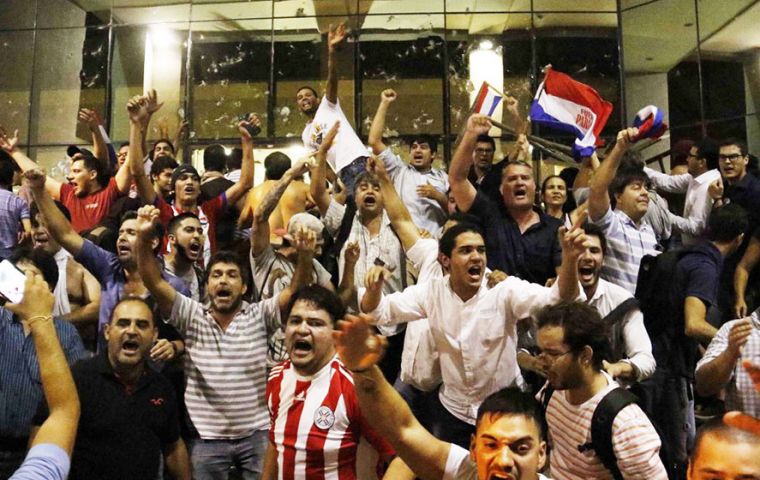 Television images showed protesters breaking windows of the Congress after several hours of escalating violence and confrontations with police. 