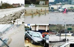 Mud and water covers cars and floods shops in downtown Comodoro Rivadavia
