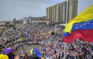Thousands of people waving Venezuelan flags and shouting “No more dictatorship” took to the streets in the capital and across the oil-rich nation. 