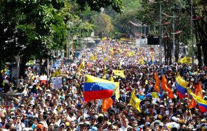 Earlier Wednesday thousands marched in Caracas seeking to deliver a message to the national ombudsman, but were met tear gas that sent demonstrators running.