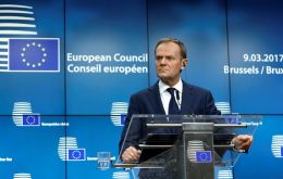 In a letter to the EU-27 European Council President Donald Tusk says agreement on “people, money and Ireland” must come before Brexit negotiations