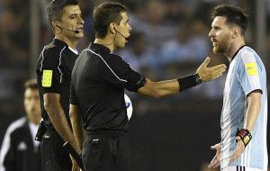 Superstar Lionel Messi discussing with the referees and assistants 