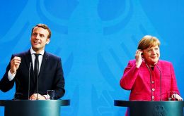 Macron and Merkel said they would work together more closely on defense, Euro zone reform and reducing bureaucracy. 