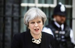 “It is time to say enough is enough,” Theresa May said outside her Downing Street office, where British flags flew at half-staff. 
