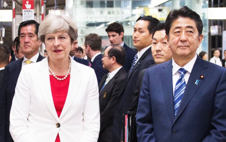 Mrs. May is set to reiterate support for Japan and tell premier Shinzo Abe that she is “outraged” by Pyongyang's firing of the missile.