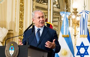 “We know without a doubt that Iran and Hezbollah initiated and backed up the attacks,” Netanyahu told reporters in Buenos Aires