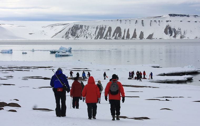 “Safety is an important aspect of responsible polar travel. Bringing tourists safely through polar bear country in Svalbard is just another day on the job for an Arctic guide. (Pic: Ilja Leo Lang)