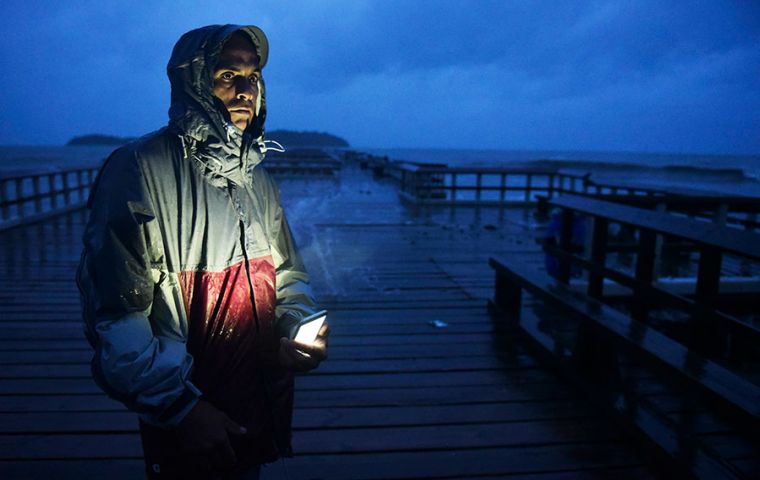 The US National Hurricane Center said “catastrophic” flooding was sweeping parts of Puerto Rico and left the island with no power 