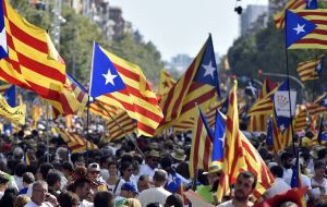 Demonstrators carried pro-independence flags and signs calling for the October 1 vote that the Spanish government calls illegal and has pledged to stop. 