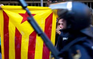 Meanwhile the Spanish interior ministry said 12 police officers had been hurt and three people arrested. It added that 92 polling stations had been closed.