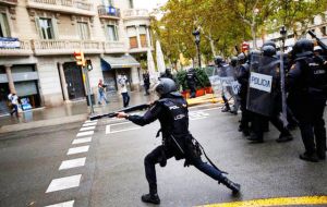 Spain’s anti-riot squads fired rubber bullets smashed into polling stations and beat protesters with batons to disperse voters on the day.