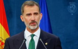 King Felipe VI said Catalonia is an essential part of the country and Spain would solve the problem through democratic institutions.
