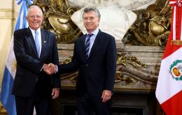President Mauricio Macri in Buenos Aires and visiting Pedro Pablo Kuczynski said the two countries would discuss the price of Peruvian corn imports from Argentina. 