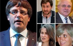 Puigdemont wrote on Twitter that he and his colleagues, Meritxell Serret, Antoni Comin, Lluis Puig and Clara Ponsati, would cooperate with the Belgian authorities.