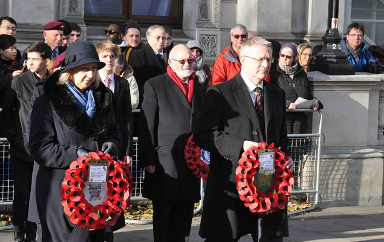 Falklands Government Representative Ms Sukey Cameron and Mr Andrew Rosindell MP go forward to lay their wreaths for the FI Government and the FI All-Party Parliamentary Group