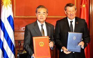 Chinese foreign minister Wang Yi with his peer Rodolfo Nin Novoa