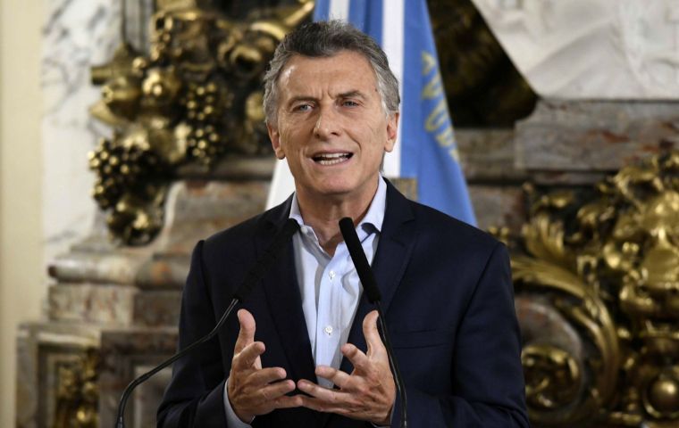 “If Argentines chip in, all of us who are part of politics must make twice the effort and lead by example,” Macri said