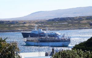 A contrast in 'shipping activity' in Stanley Harbour today. A jigger and a luxury yacht 'Legend' (Pic N. Jennings)