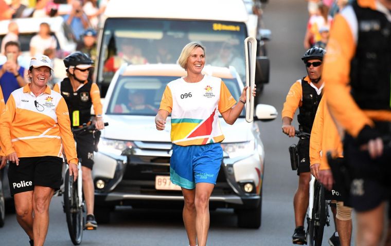 The Queen's Baton came into the stadium with eight-time Olympic and 15 Commonwealth Games swim medalist “Madame Butterfly” Susie O'Neill