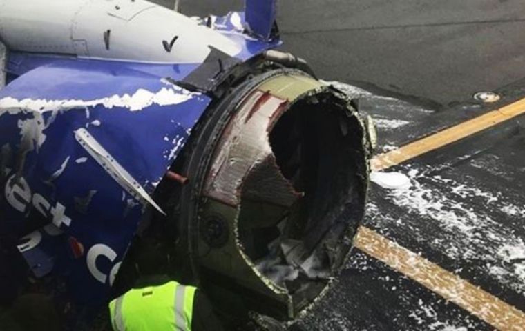 Picture of the exploded engine after the plane landed safely.  (AP) 