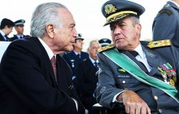 The general spoke alongside Temer, who himself has been charged twice with corruption but so far remains protected by Congress from having to face a trial.