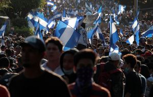 There was a sea of blue and white flags as the crowds massed outside the city's cathedral, among them young people, the elderly and farmers