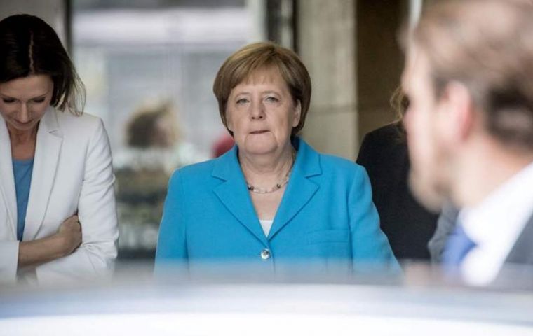 Officials of Merkel's Christian Democrat party broke off their own separate meeting in Berlin about an hour earlier, saying they would resume at 8:30 a.m.