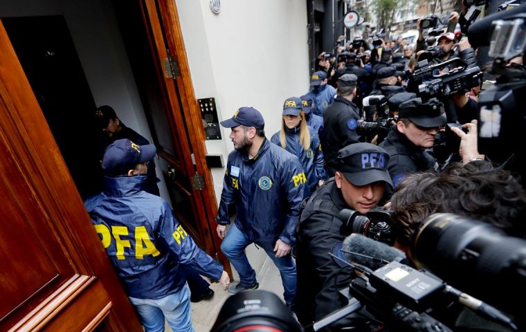 Police officers entered CFK's residence in the exclusive Recoleta neighborhood of Buenos Aires as police vans and fire trucks surrounded the building 