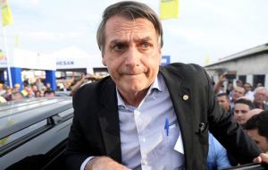 Bolsonaro advocates easing gun controls to allow Brazilians to own guns and defend themselves from criminals, besides giving police carte blanche to shoot