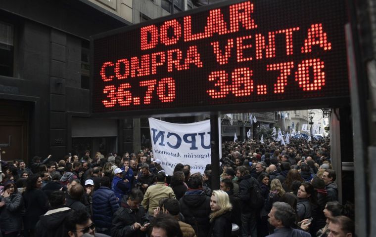 The Argentine peso was stronger at 38.52 per dollar on Wednesday, marking a rare pause in losses that have shaved more than 50% off its value this year