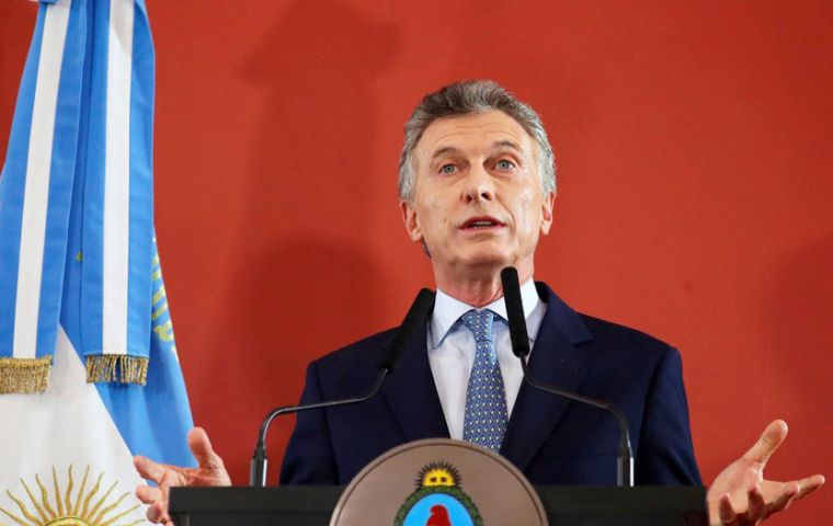 Macri promised to increase social spending to protect the poor and acknowledged the coming months would be difficult for Argentines