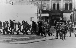 Thirteen people died in Londonderry after soldiers opened fire in the city in January 1972. A 14th person died later.