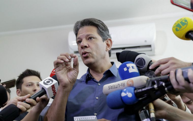 Haddad accused Bolsonaro of sending false WhatsApp messages, including one that the leftist was plotting to let authorities choose the gender of 5-year-olds