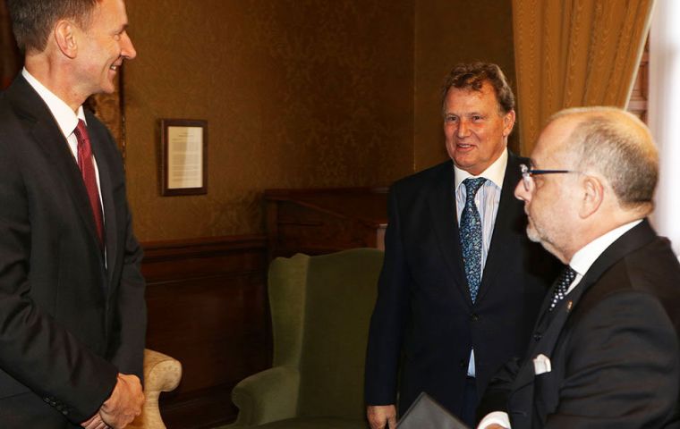 Jeremy Hunt and Jorge Faurie, accompanied by Ambassador Carlos Sersale in London