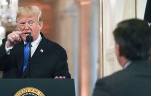 Trump called Acosta “a rude, terrible person” as he tried to ask the president a question about characterization the immigration caravan an “invasion”
