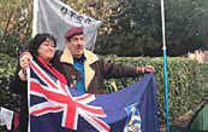 MLA Roberts stands with Gus Hale next to his tent in
Shropshire